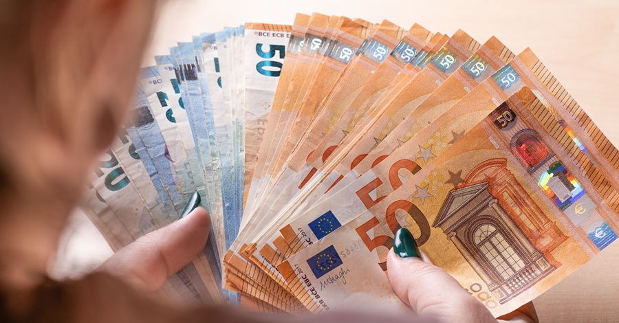 business, finance, saving, banking and people concept - close-up